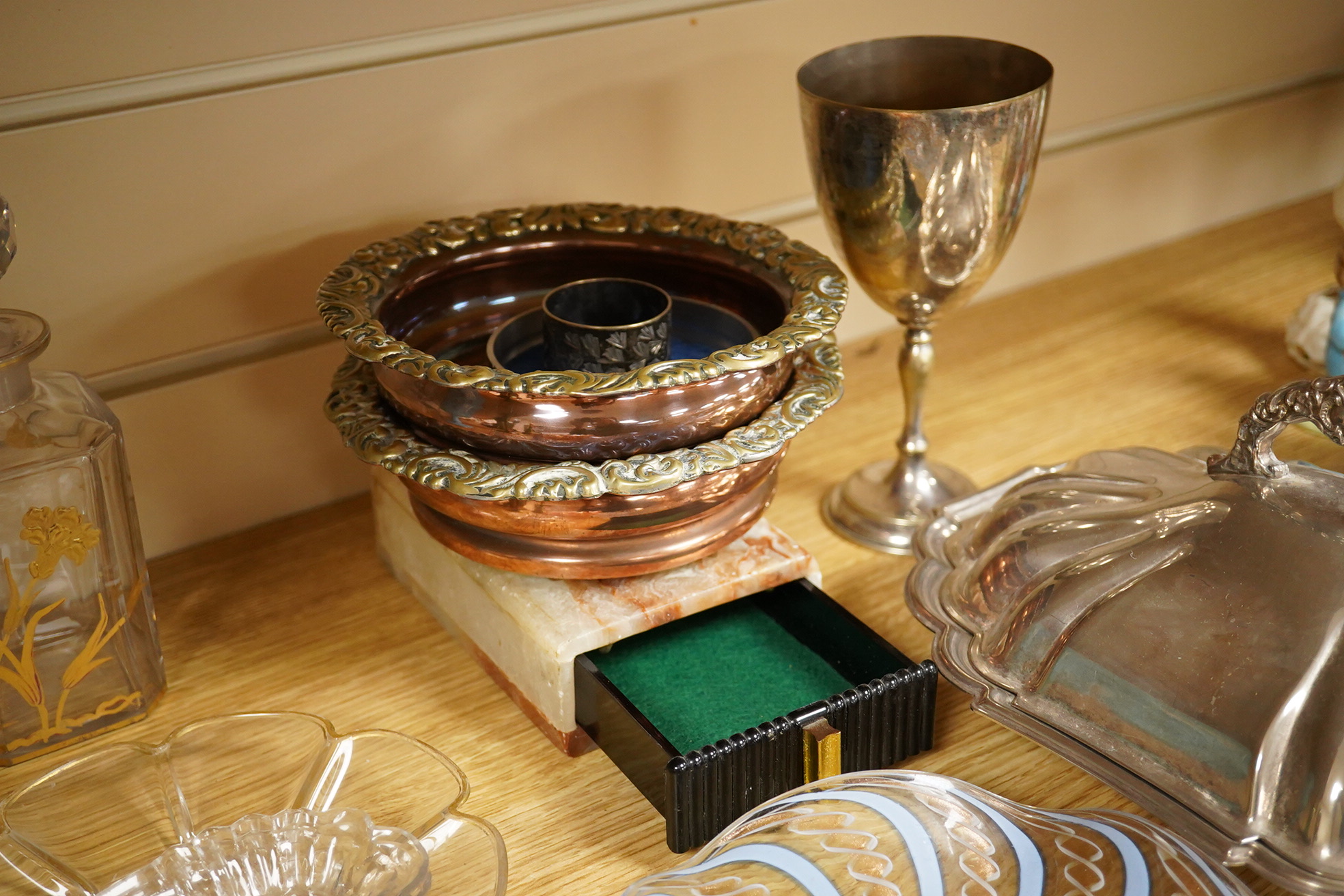 A Victorian gilt and enamelled green glass decanter, a similar vase, a small square decanter, Venetian dishes, silver plated coasters, etc